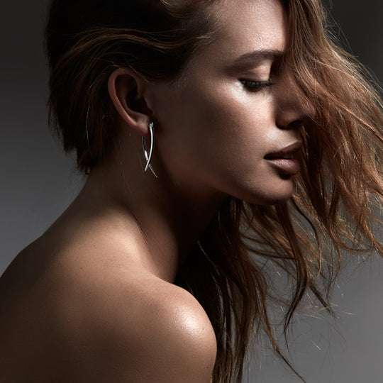 SILVER DIAMOND CROSSOVER EARRINGS